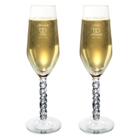 Orrefors Carat champagneglas med gravyr med symbol ringar, i 2-pack.